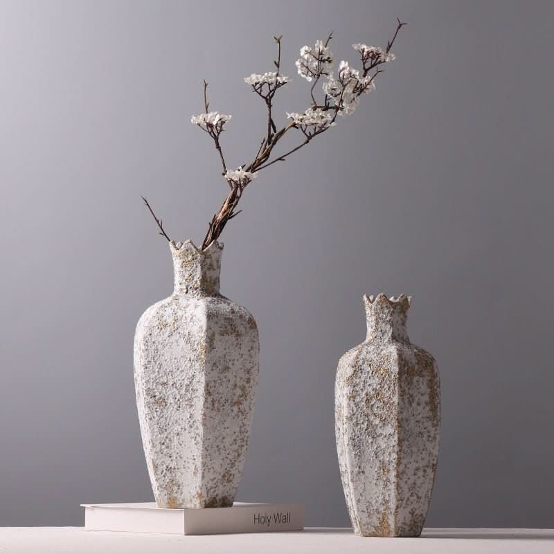 Textured Stone Vase With Hexagonal Shape, white and gold stoneware, with white blossoms.