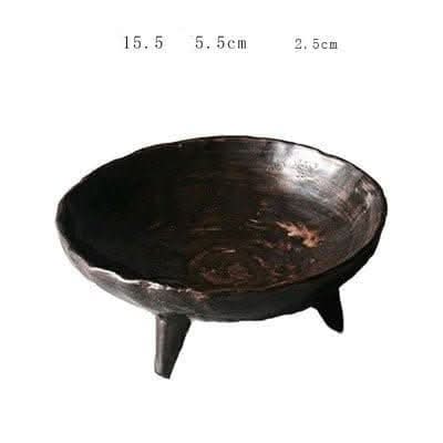 Tripod Stoneware Ceramic Irregular Fruit Bowl in dark rustic finish on white background
