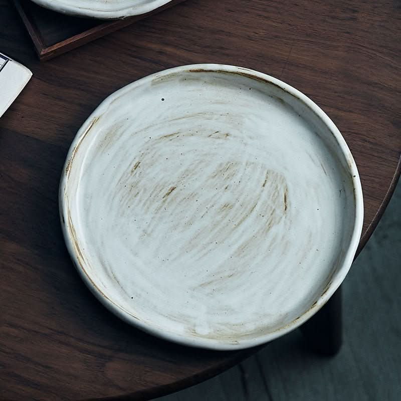 Stoneware Plates With White Glaze, rustic texture on wooden table