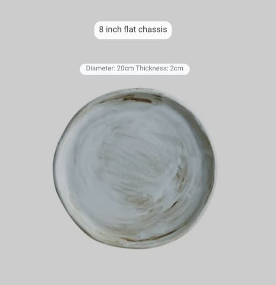 Rustic stoneware plate with white glaze and brown accents, 8-inch diameter.