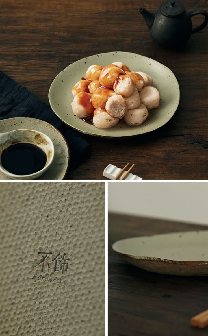 Handmade unglazed earthenware dinner plates with textured surface, on dark wood table.