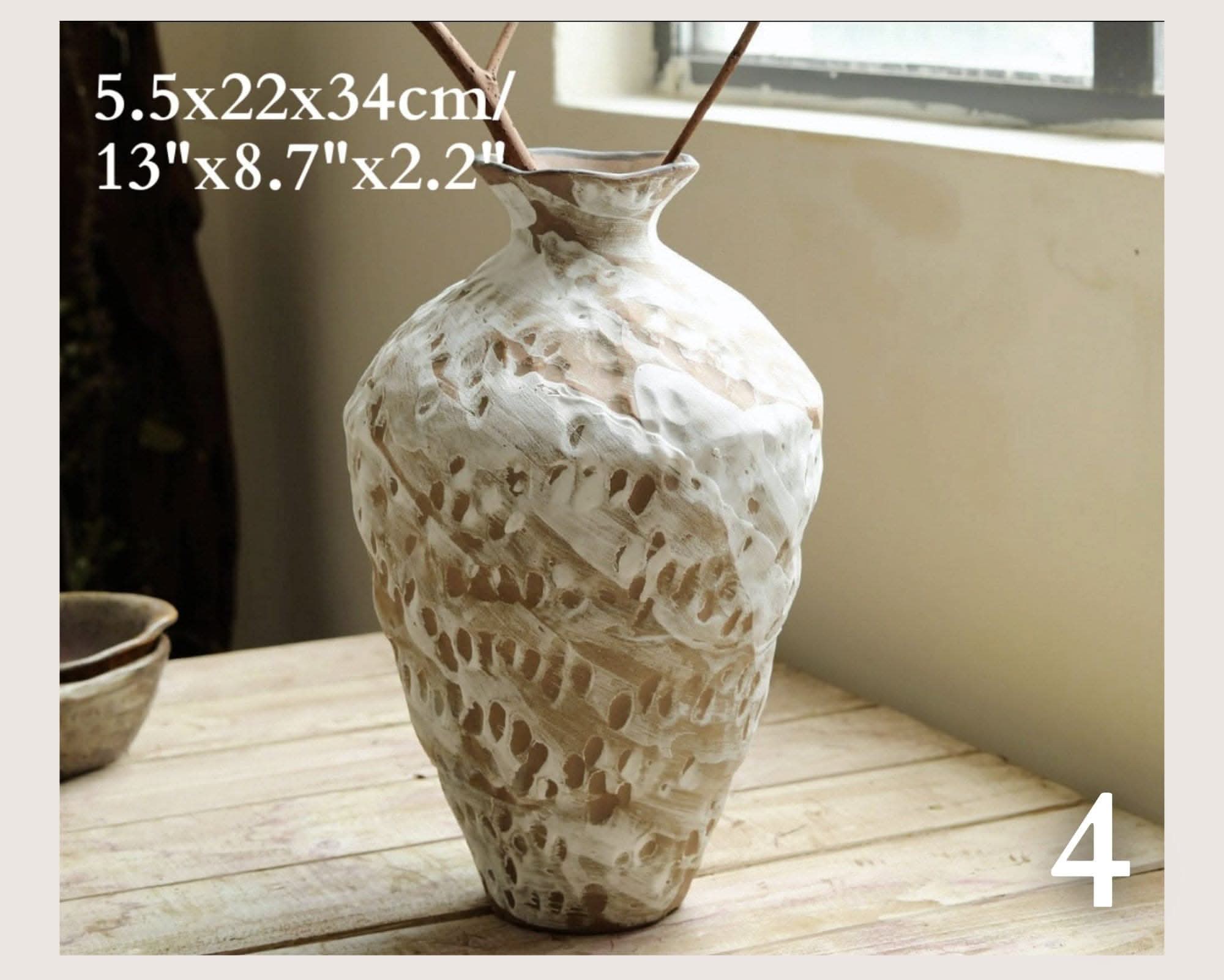 Wabi-Sabi Distressed Rustic Vase: Creamy white textured ceramic on natural wood table.