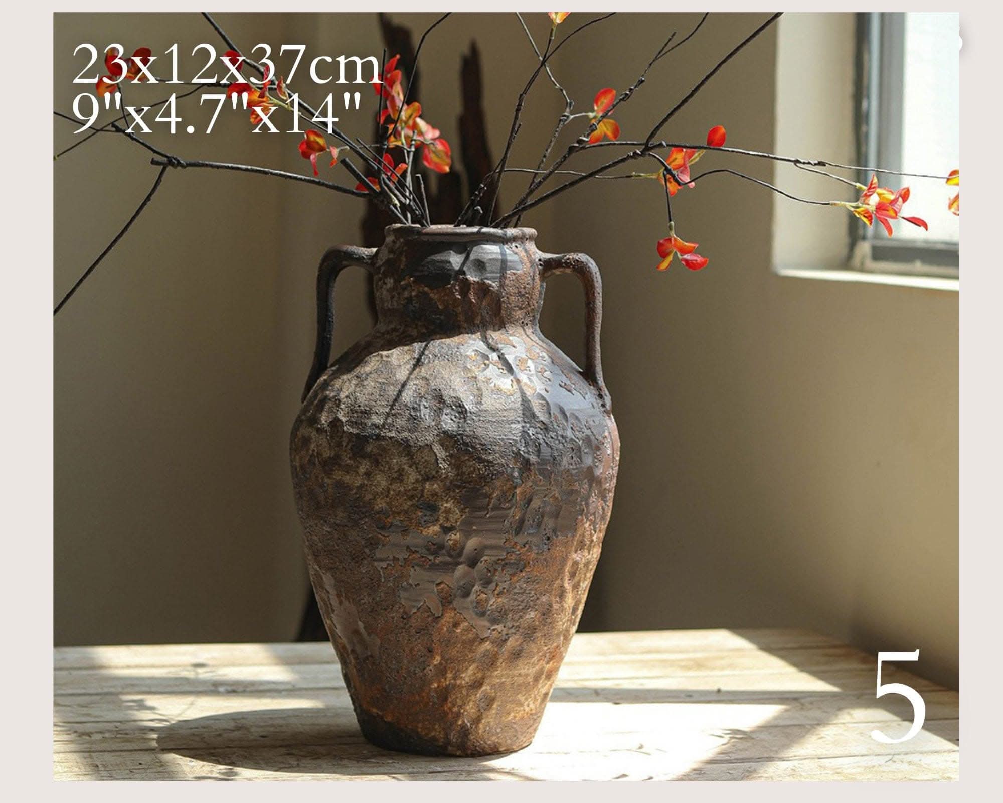 Wabi-Sabi Distressed Rustic Vase with handles, brown textured ceramic, holding branches with red flowers.