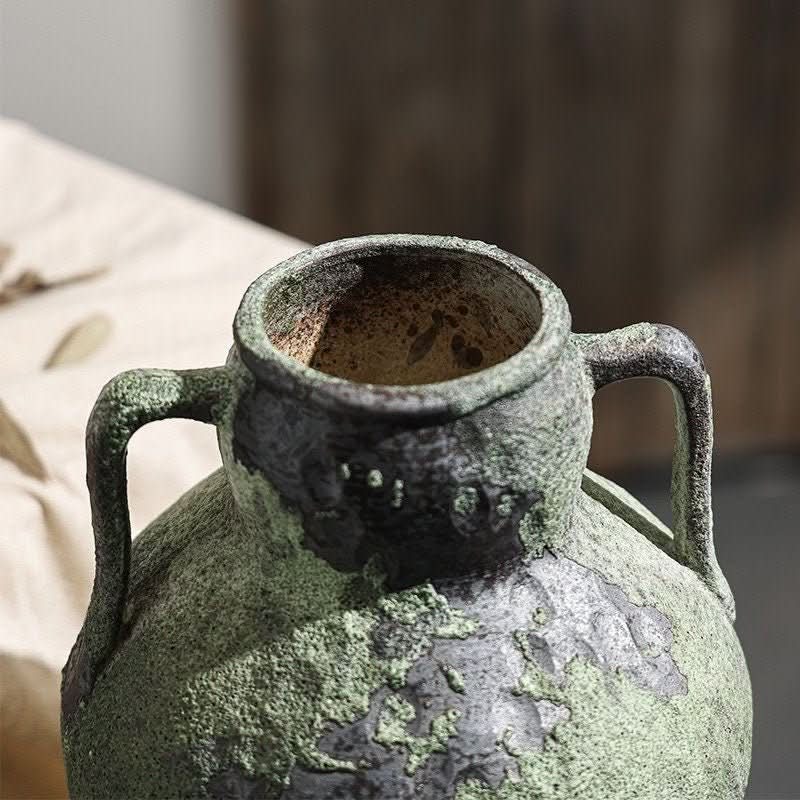 Wabi-Sabi Distressed Vases: Rustic gray-toned ceramic vase with textured finish and dual handles.