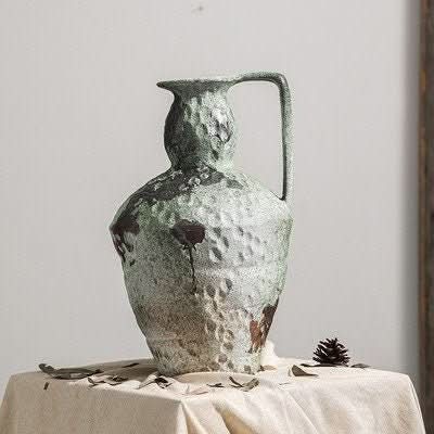 Wabi-Sabi Distressed Vase in gray tones, textured ceramic with a rustic handle.