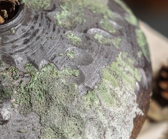 Wabi-Sabi Distressed Vases in gray tones with textured patina. Home decor.