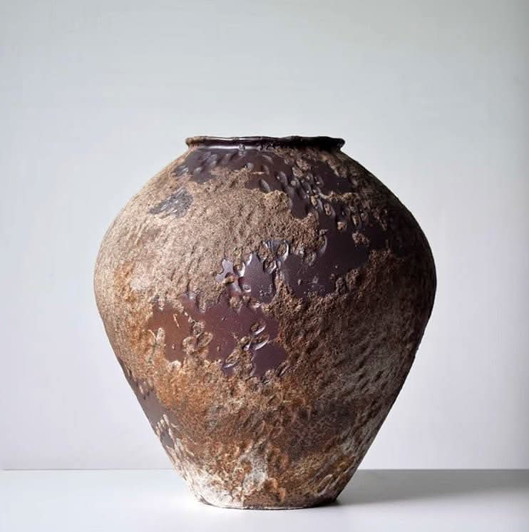 Wabi-sabi rounded ceramic vase, earthy brown distressed texture, 35x35cm.
