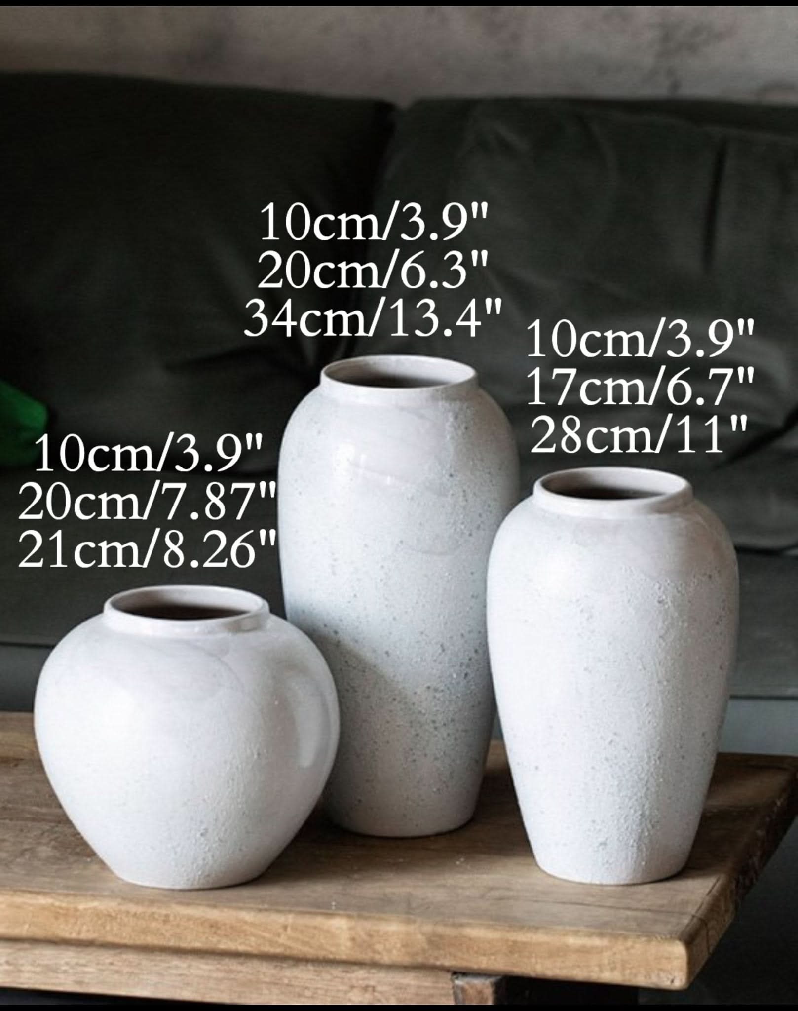 White ceramic vases with mixed textures, home decor.