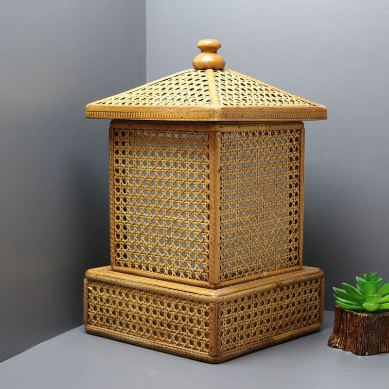 Handmade rattan table lamp in lantern shape, natural wood tones, home decor accent.